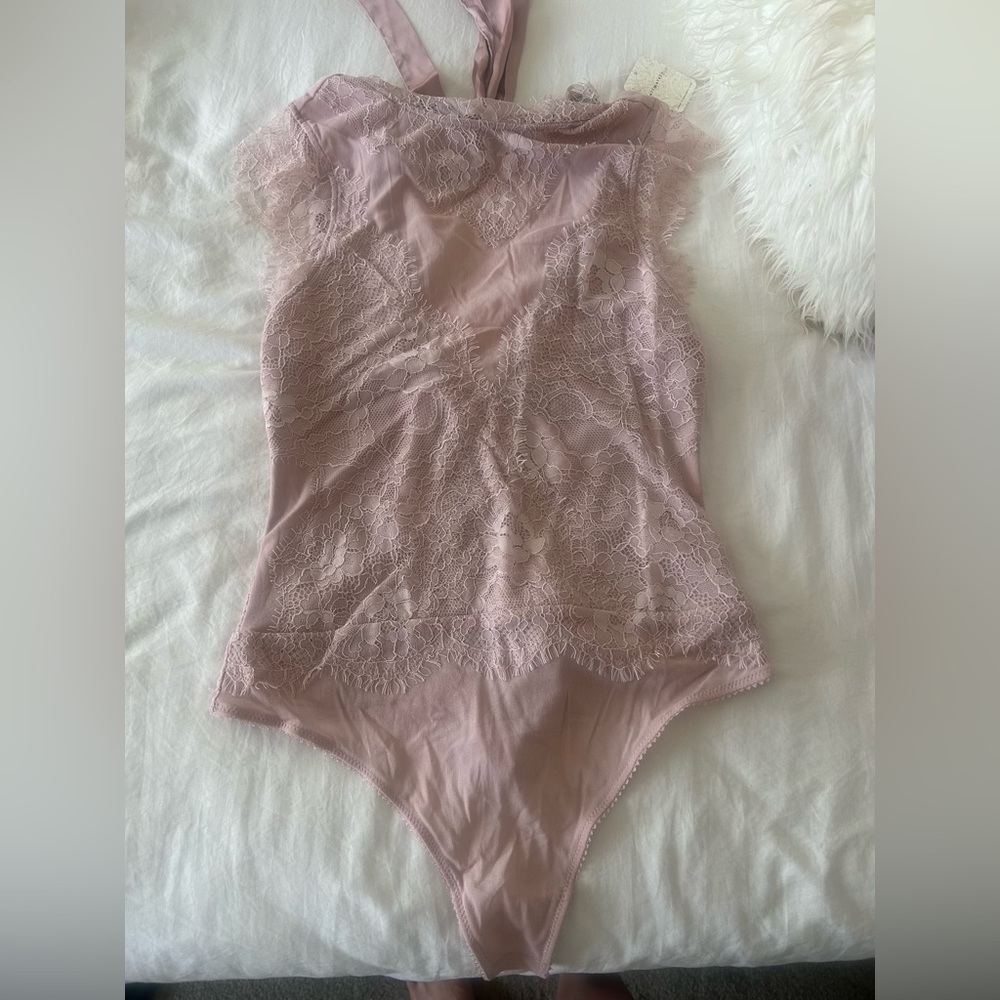 Brand new with tags!! Free people Elegant Pink Lace Bodysuit